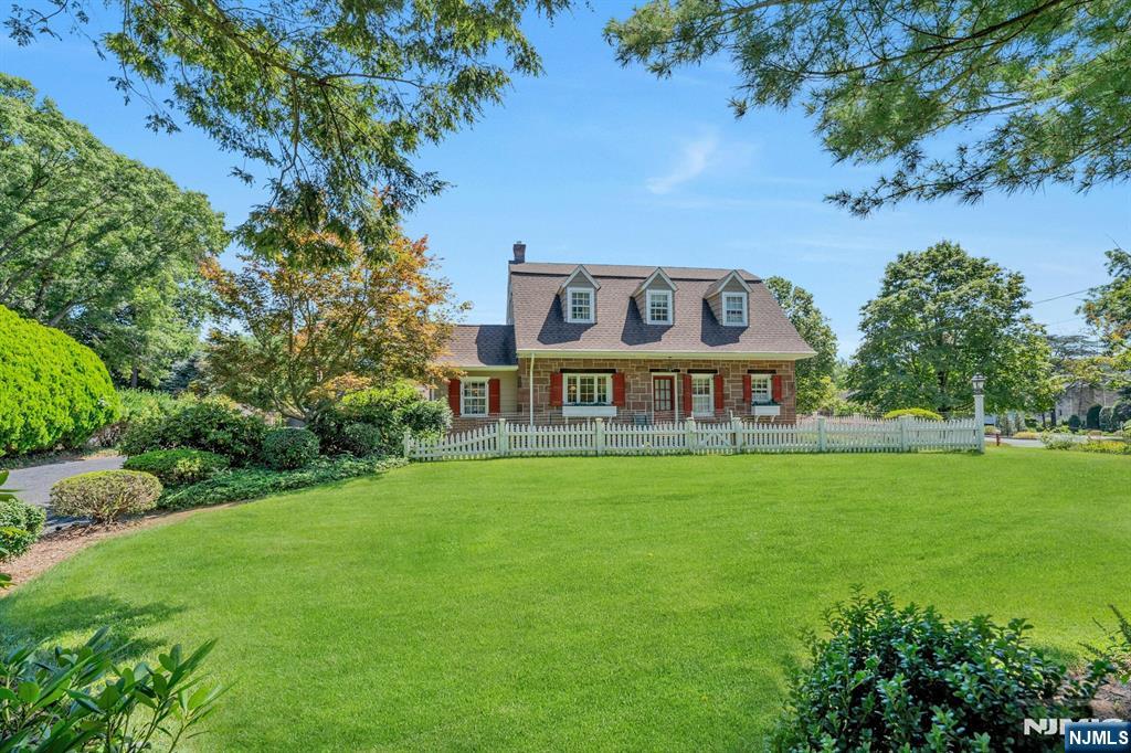 174 Paramus Road Paramus, NJ 07652 - Photo 45 of 45 a view of a big yard with large trees and a big yard