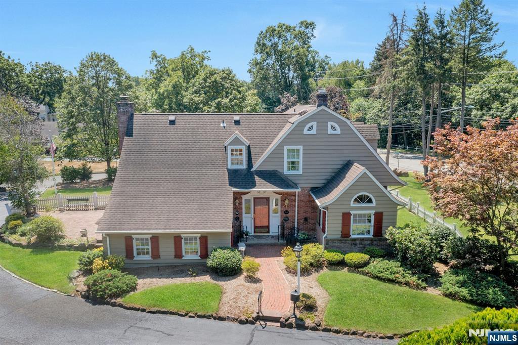 174 Paramus Road Paramus, NJ 07652 - Photo 6 of 45 a front view of house with yard and green space