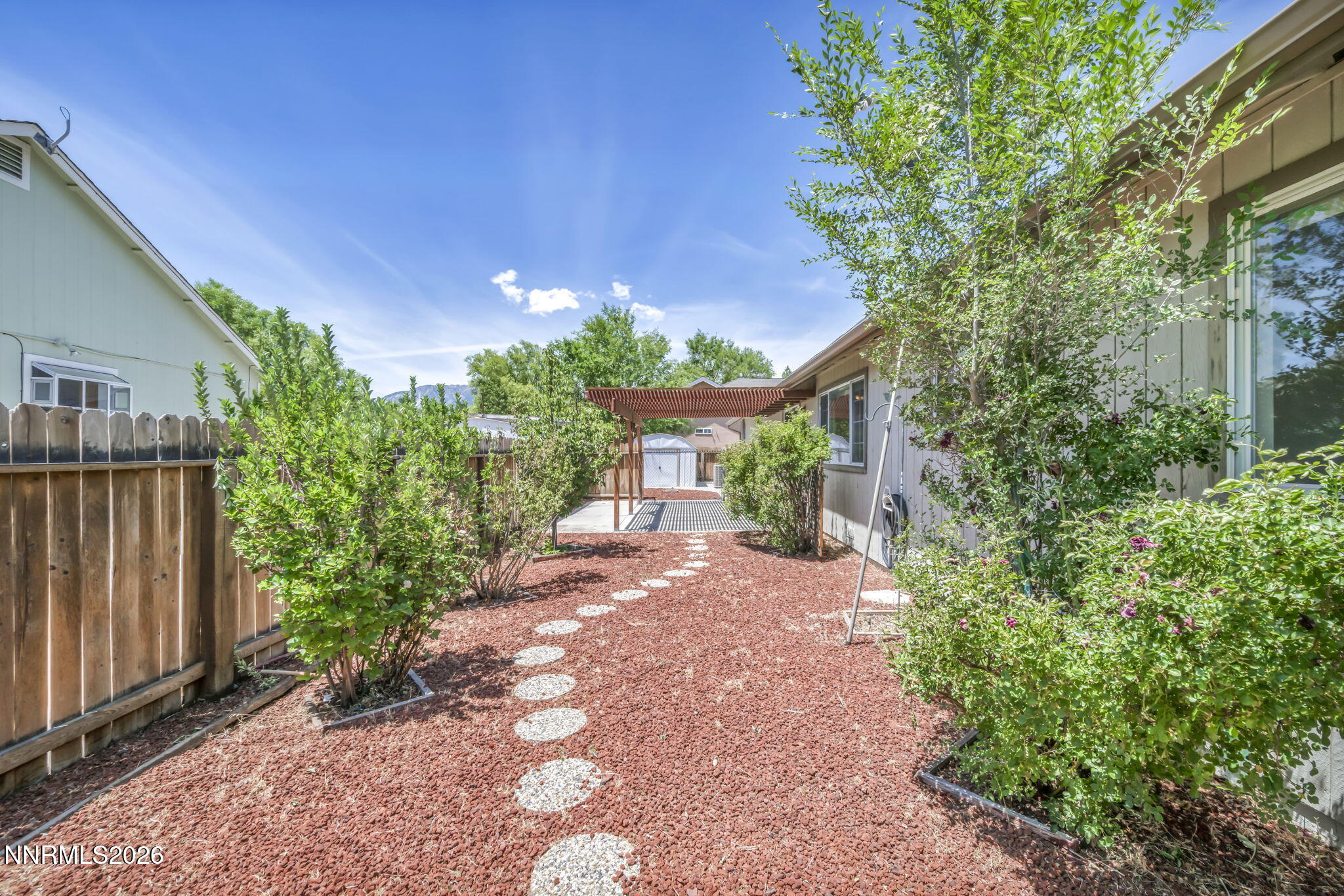 692 Lassen Way Gardnerville, NV 89460 - Photo 29 of 34 a front view of a house with a yard