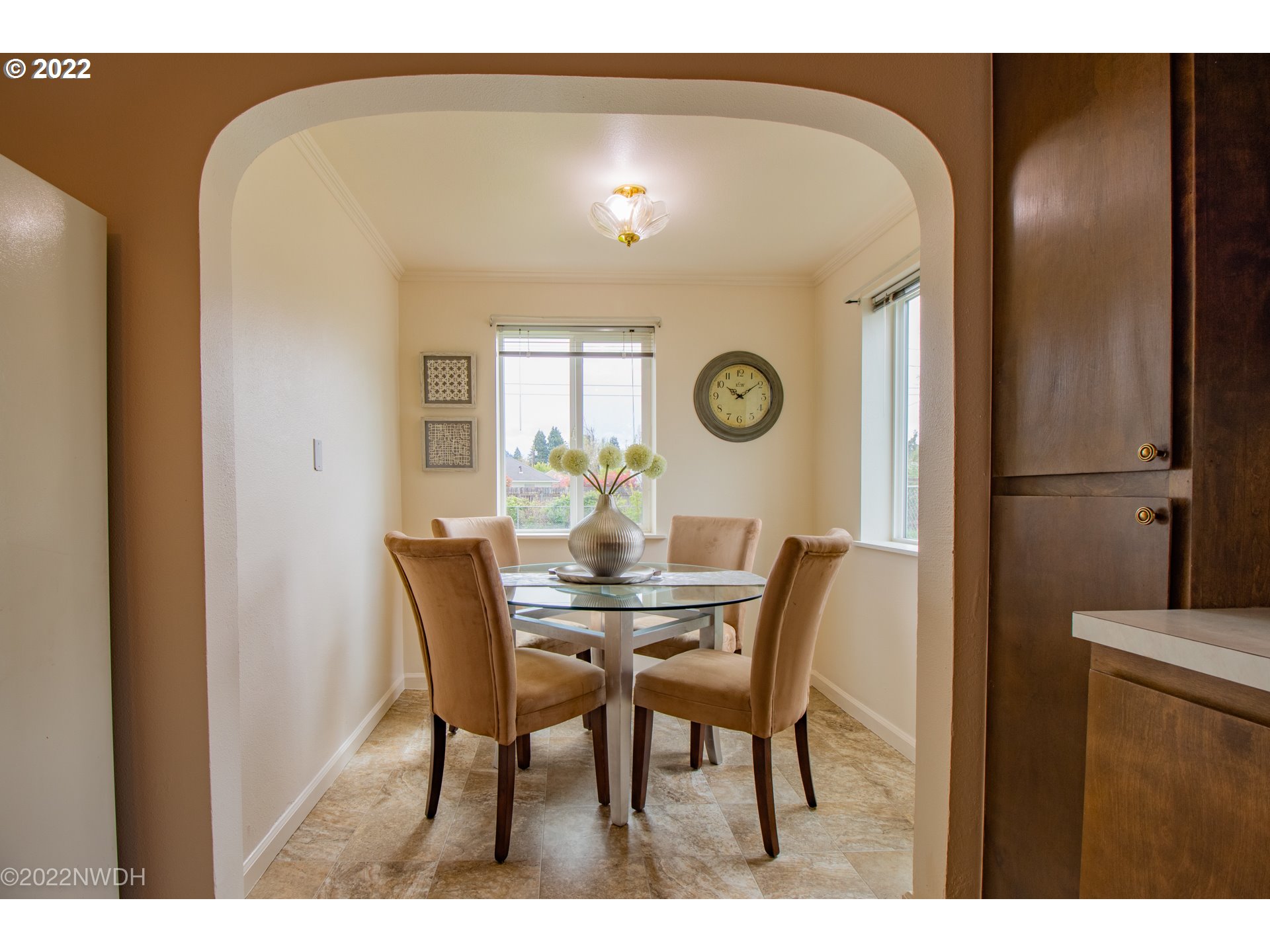 1055 N Street Springfield, OR 97477 - Photo 5 of 23 a view of a dining room with furniture and a large window