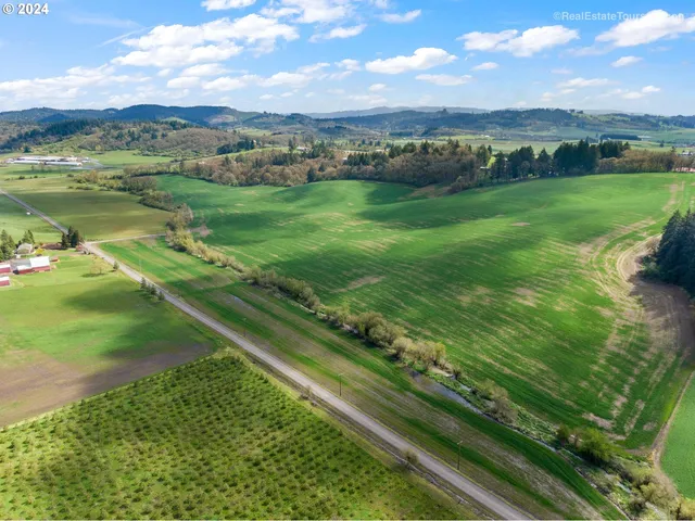 a view of a city with an ocean view