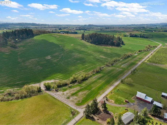 a view of a lake with a yard