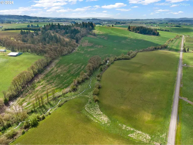 a view of a lake with a yard