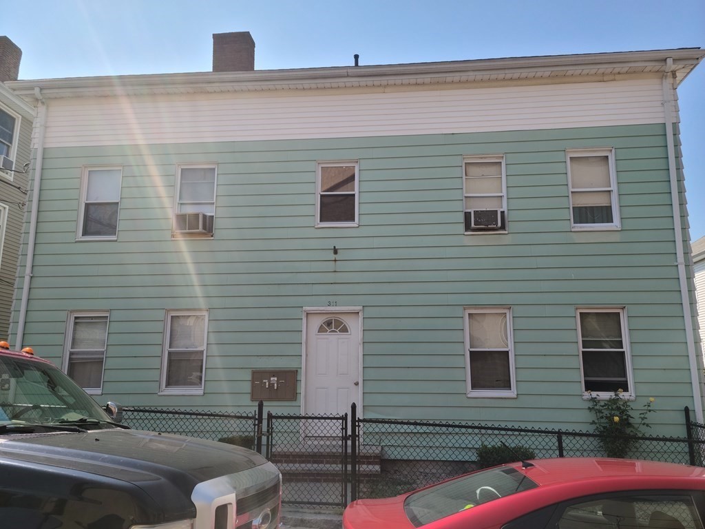 311 Union Street Fall River, MA 02721 - Photo 1 of 4 a front view of a house with street