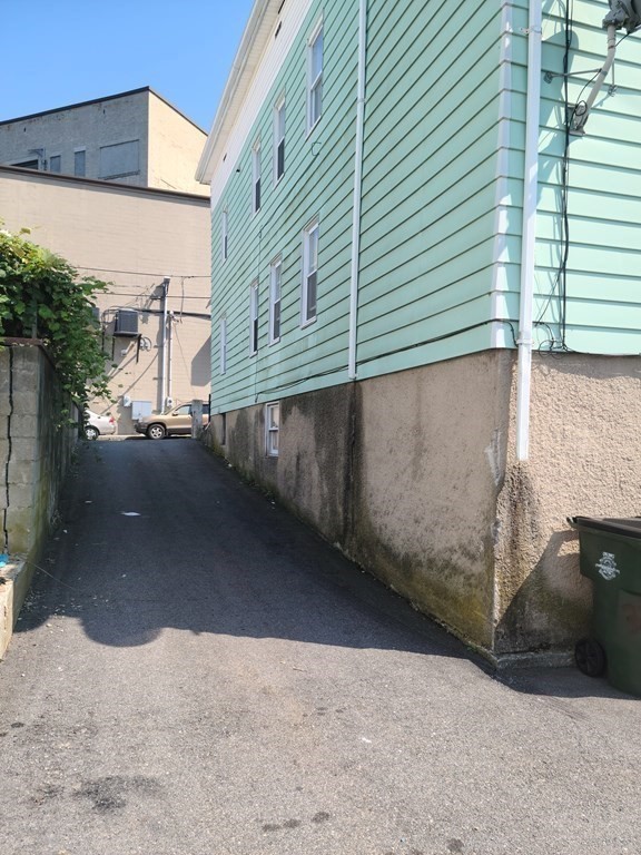 311 Union Street Fall River, MA 02721 - Photo 3 of 4 a view of a street with big house