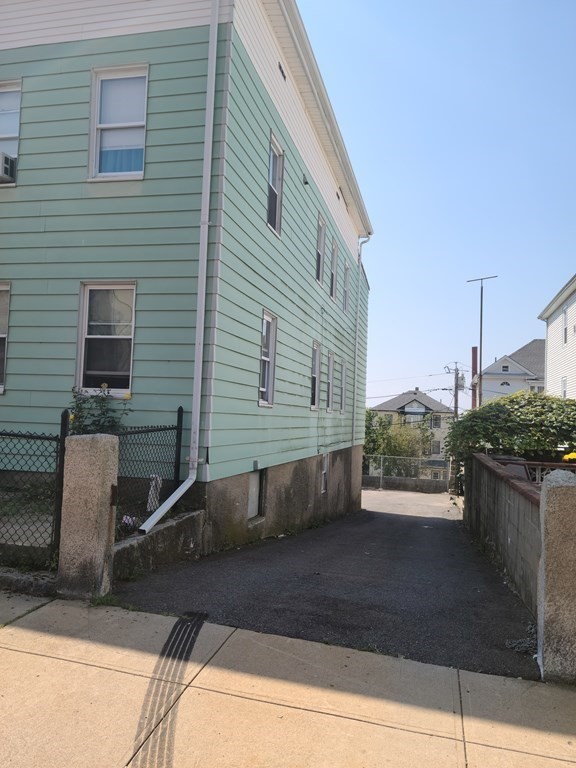 311 Union Street Fall River, MA 02721 - Photo 4 of 4 a view of a back yard of the house