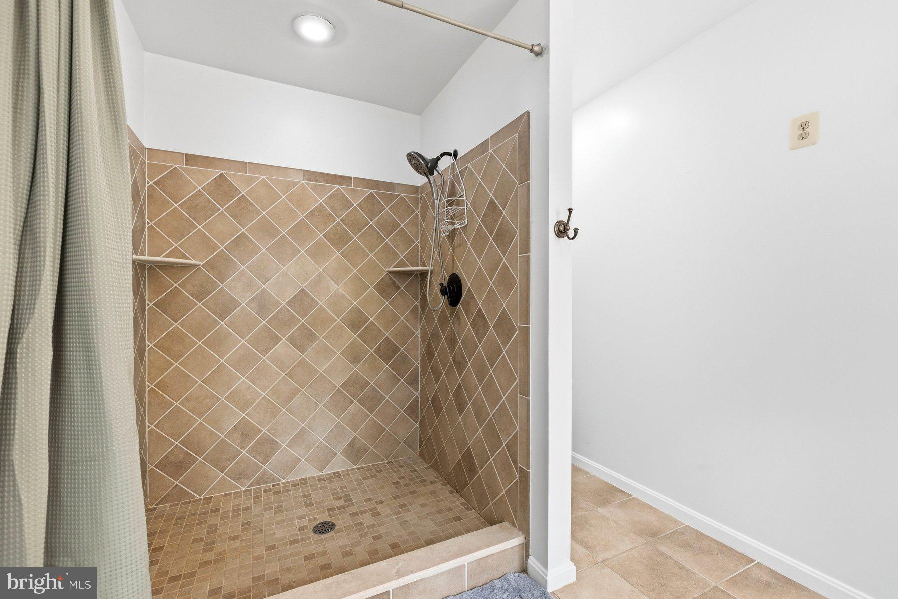 9320 Sam Owing's Place Owings, MD 20736 - Photo 23 of 40 Primary bath w/walk-in shower