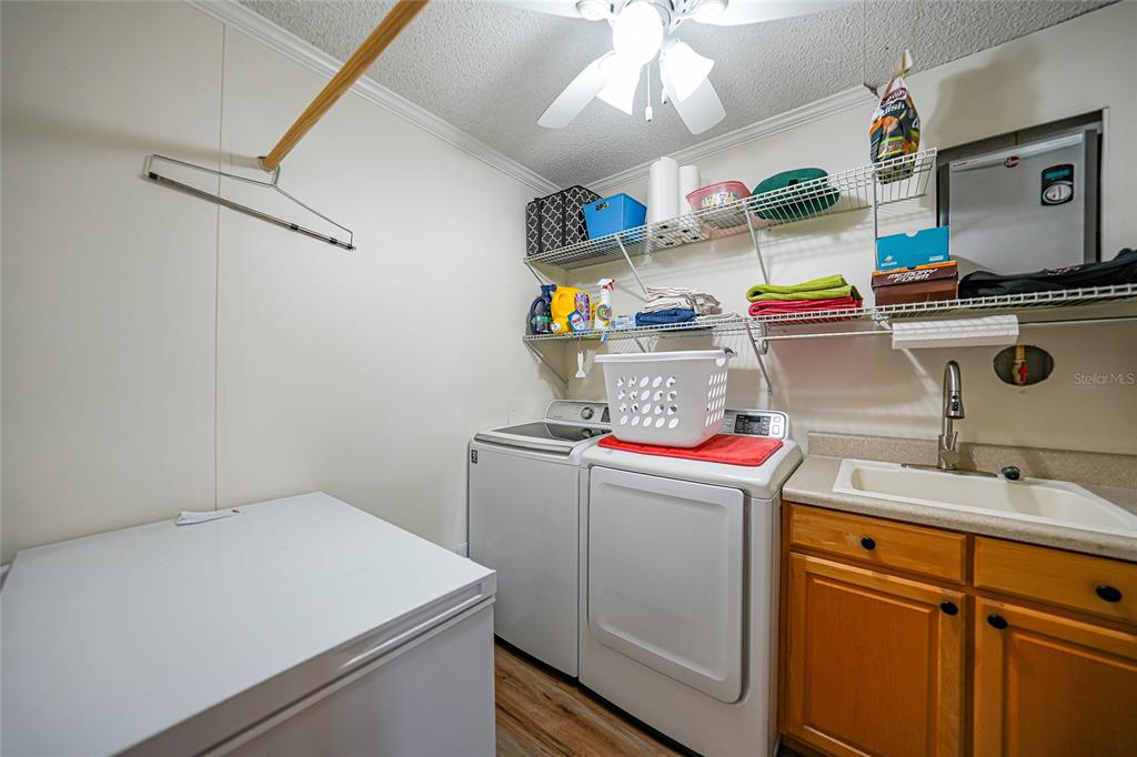 10303 Burnt Store Road, Unit 143 Punta Gorda, FL 33950 - Photo 21 of 42 a room with storage and utility