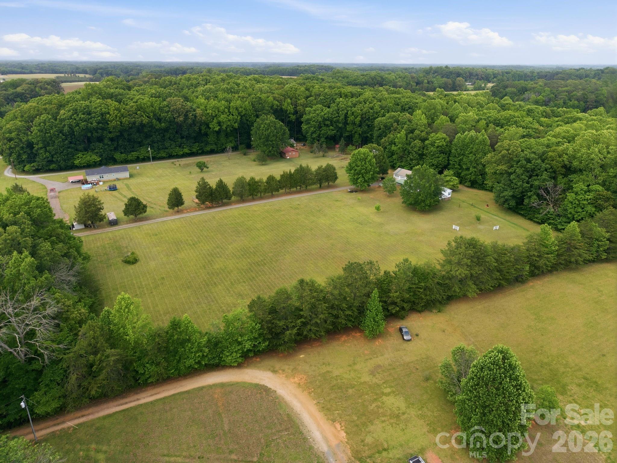 Tbd Sisk-Carter Road Rockwell, NC 28138 - Photo 2 of 14 a view of a lake with a yard