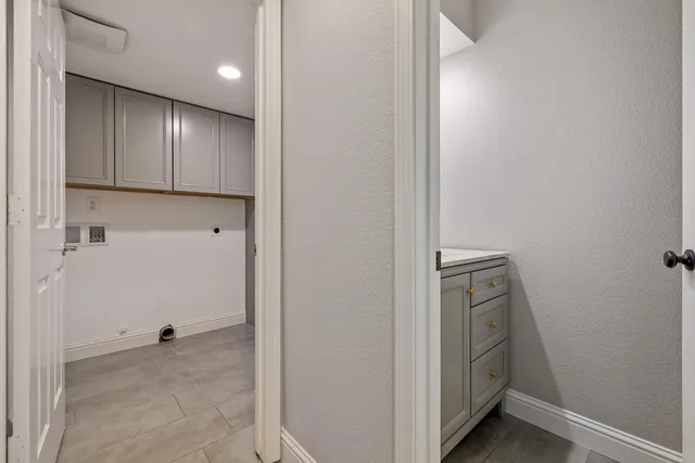 a view of a kitchen cabinets