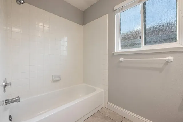 a bathroom with a bathtub