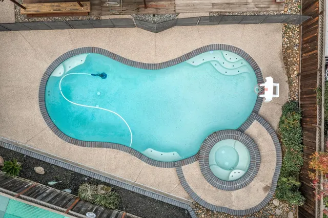 an aerial view of a swimming pool