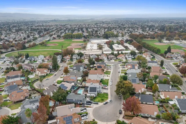 an aerial view of a city with lots of residential buildings