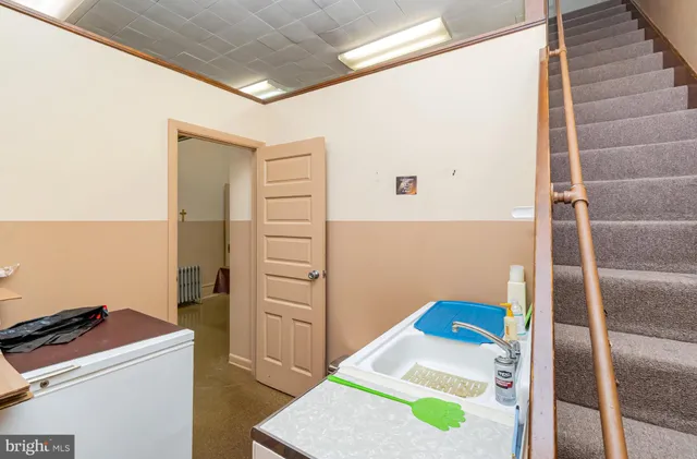 a room with furniture and a window