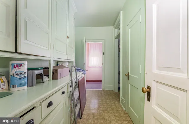 a bedroom with a bed and a shower