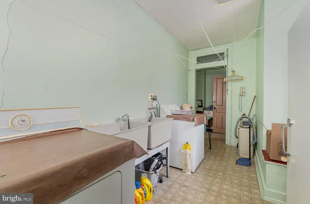 a bedroom with a bed and a desk