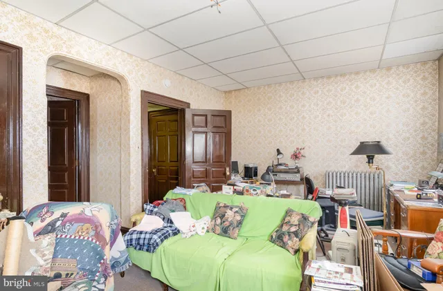 a room with furniture and a chandelier