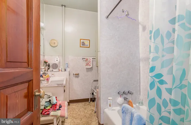 a bathroom with a toilet and a sink