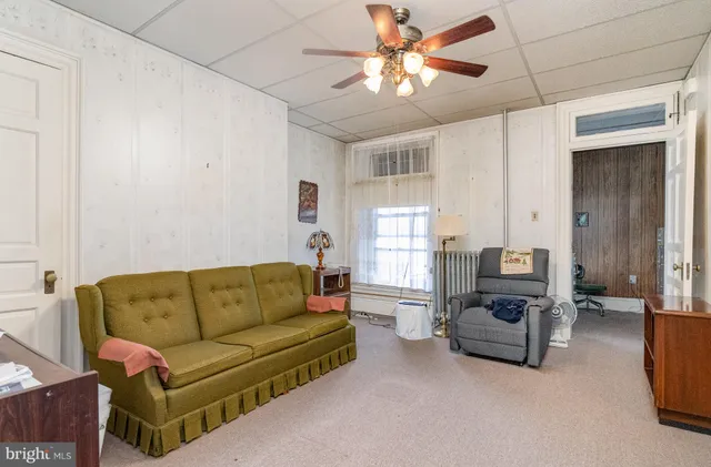 a picture of a room with a white wall and a white wall