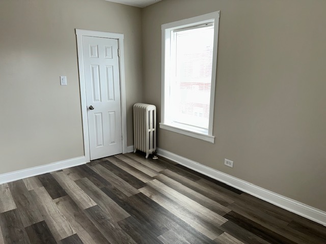 4058 West Dickens Avenue, Unit 2D Chicago, IL 60639 - Photo 7 of 10 a view of an empty room with a window
