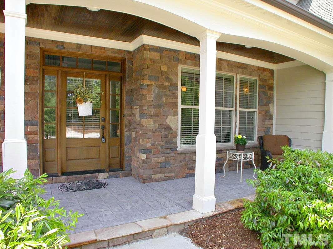 12349 Beestone Lane Raleigh, NC 27614 - Photo 2 of 25 a front view of a house with outdoor seating