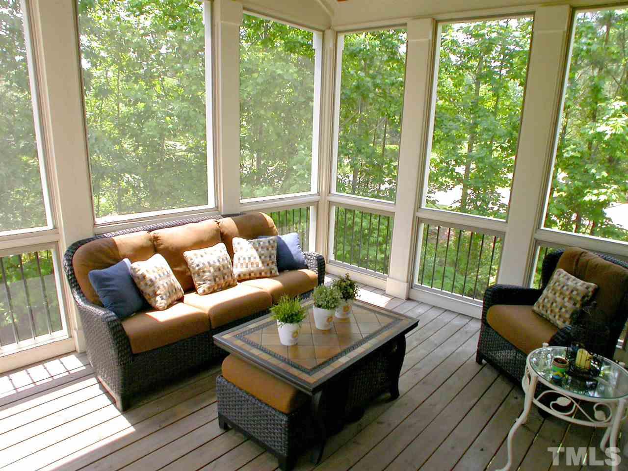 12349 Beestone Lane Raleigh, NC 27614 - Photo 22 of 25 a living room with furniture and a large window