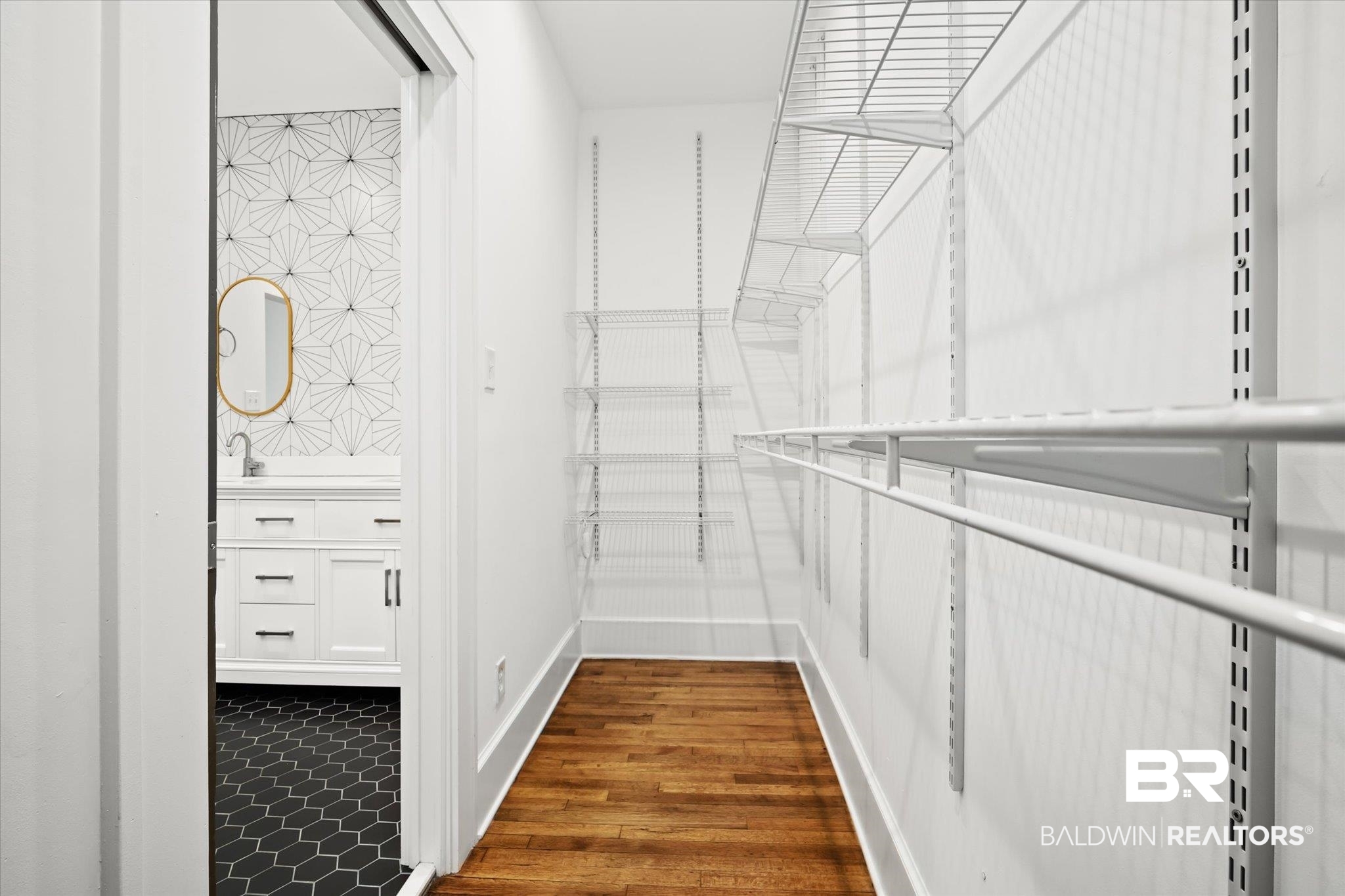 308 South Ann Street Mobile, AL 36604 - Photo 18 of 30 Walk in closet featuring hardwood / wood-style flooring