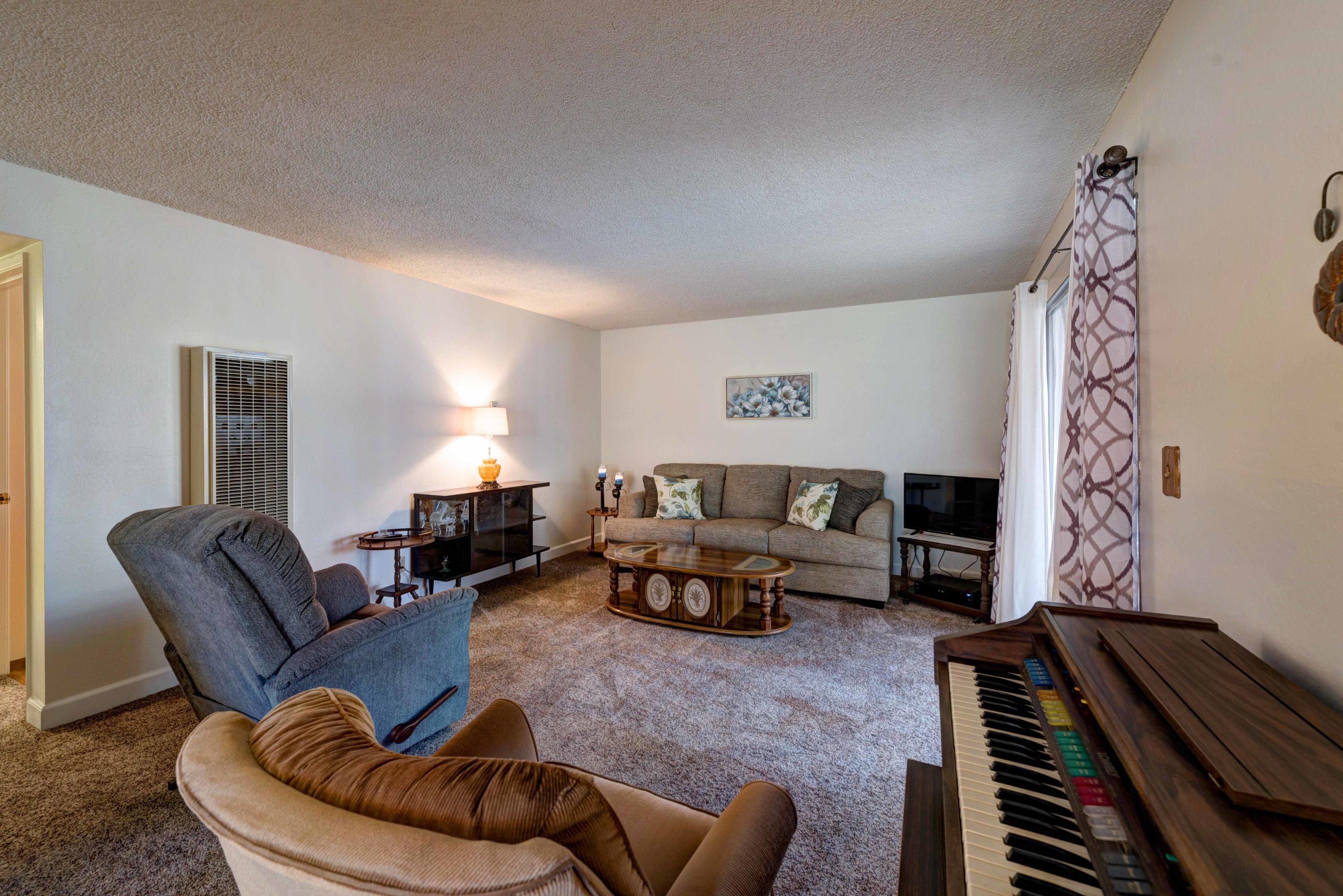 1862 Canyon Road Redding, CA 96001 - Photo 8 of 28 a living room with furniture and a window