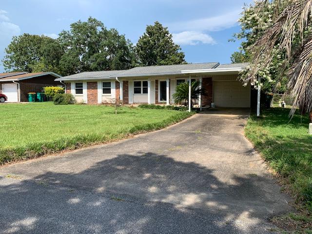 14 9th Street Shalimar, FL 32579 - Photo 2 of 15 front view of a house with a yard