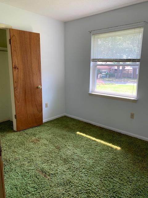 14 9th Street Shalimar, FL 32579 - Photo 8 of 15 a view of an empty room and window
