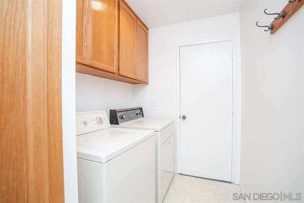 8549 Circle R Valley Lane Escondido, CA 92026 - Photo 16 of 25 a utility room with dryer and washer