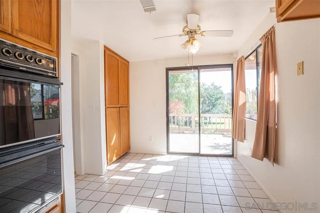 8549 Circle R Valley Lane Escondido, CA 92026 - Photo 22 of 25 a view of an entryway with a chandelier