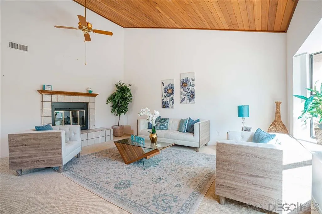 8549 Circle R Valley Lane Escondido, CA 92026 - Photo 24 of 25 a living room with furniture and wooden floor