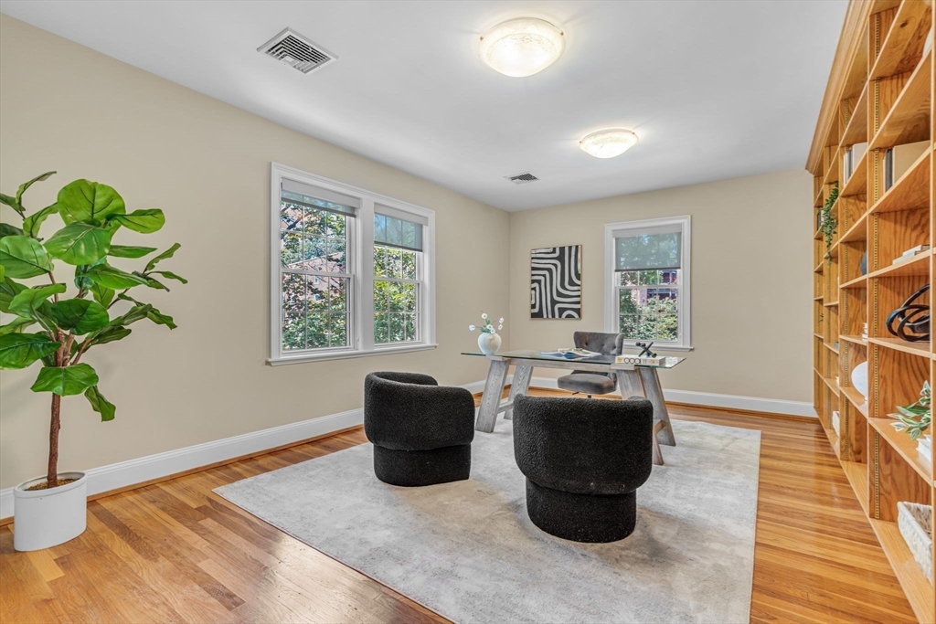 27 Newell Road, Unit 2 Brookline, MA 02446 - Photo 13 of 41 a living room with furniture and a potted plant