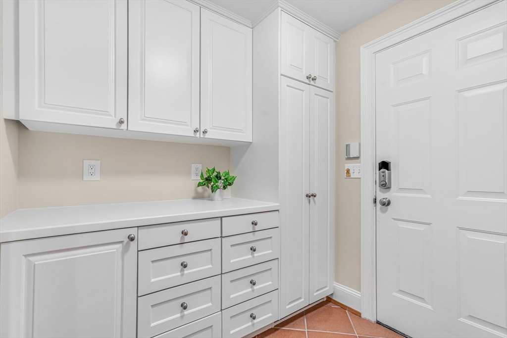 27 Newell Road, Unit 2 Brookline, MA 02446 - Photo 17 of 41 a view of cabinets and window