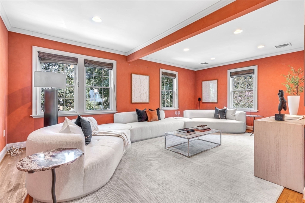 27 Newell Road, Unit 2 Brookline, MA 02446 - Photo 19 of 41 a living room with furniture and a large window