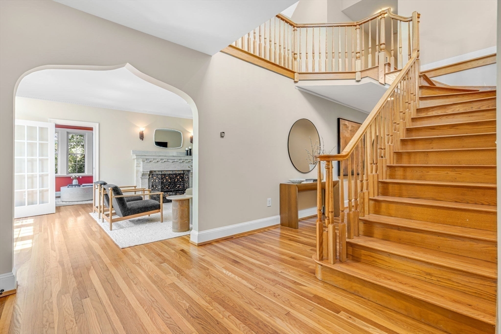 27 Newell Road, Unit 2 Brookline, MA 02446 - Photo 2 of 41 a view of entryway livingroom and hall with wooden floor