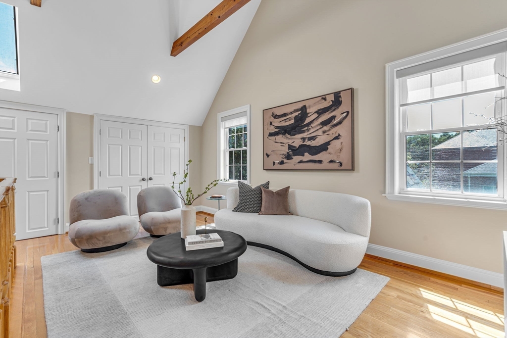 27 Newell Road, Unit 2 Brookline, MA 02446 - Photo 21 of 41 a living room with furniture and a large window