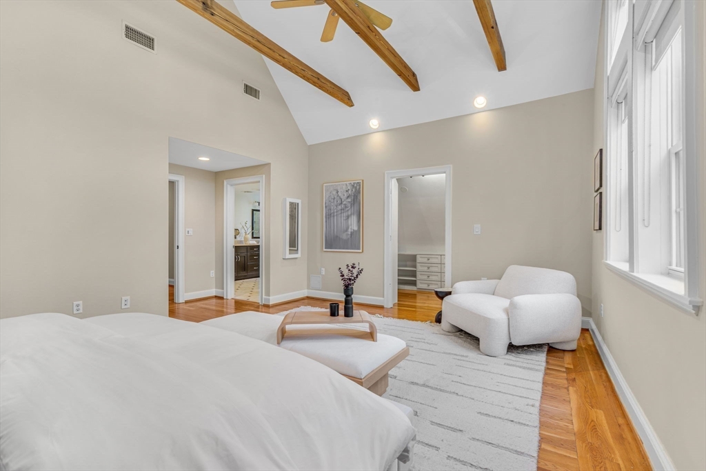 27 Newell Road, Unit 2 Brookline, MA 02446 - Photo 25 of 41 a bedroom with furniture and wooden floor