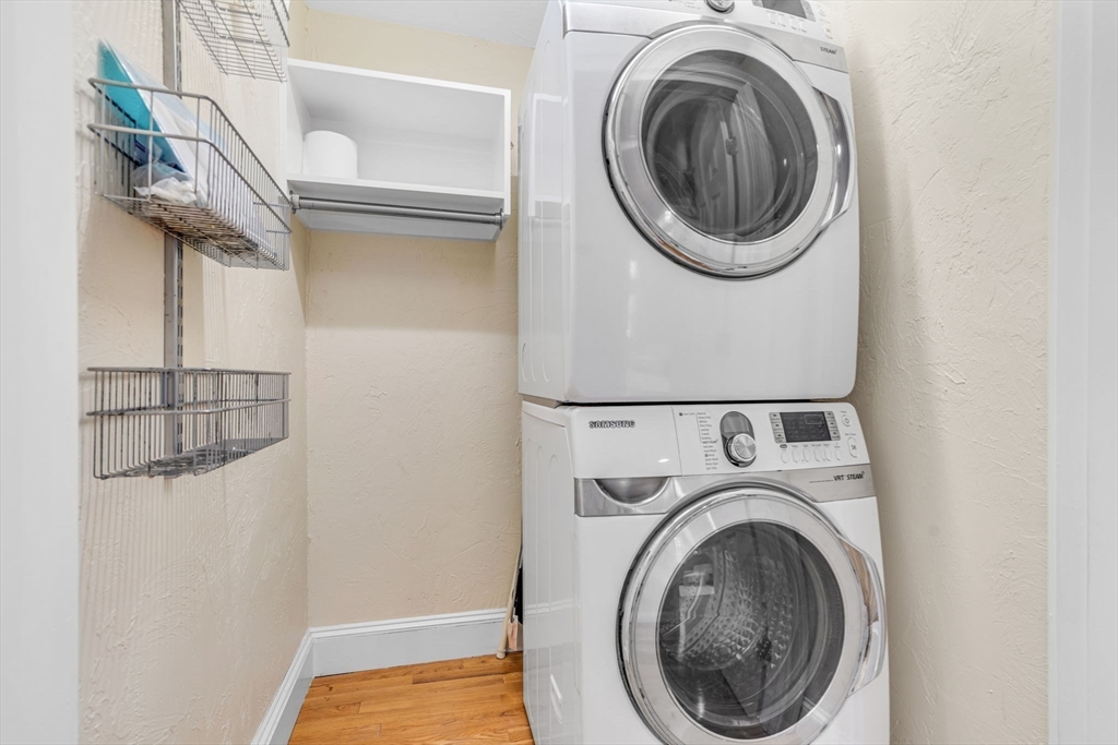 27 Newell Road, Unit 2 Brookline, MA 02446 - Photo 34 of 41 a utility room with dryer and washer