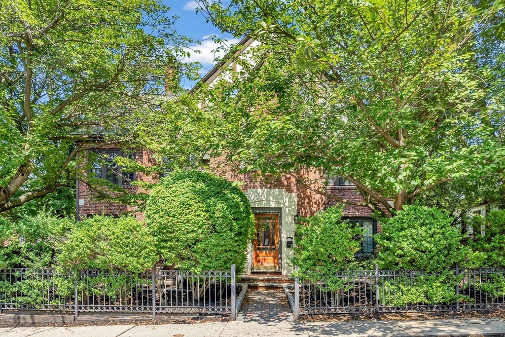 27 Newell Road, Unit 2 Brookline, MA 02446 - Photo 37 of 41 a view of a house with a tree