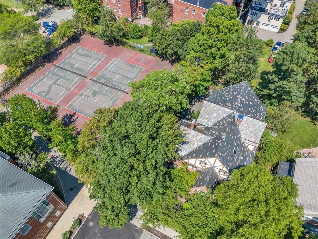 27 Newell Road, Unit 2 Brookline, MA 02446 - Photo 38 of 41 an aerial view of a house with a yard and garden