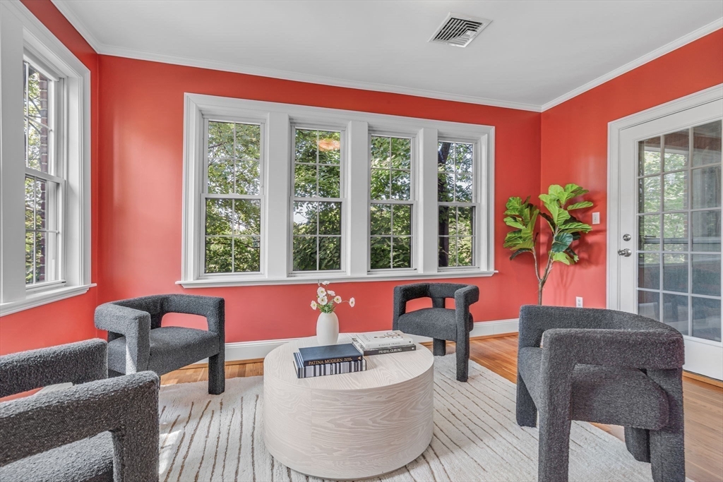 27 Newell Road, Unit 2 Brookline, MA 02446 - Photo 5 of 41 a living room with furniture and a large window