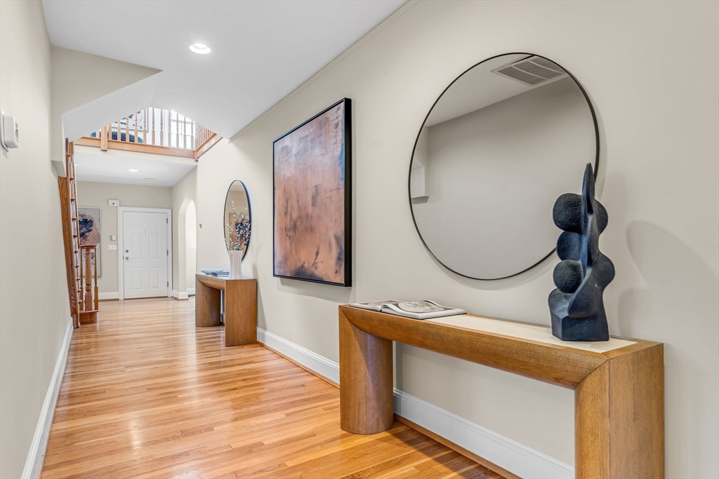 27 Newell Road, Unit 2 Brookline, MA 02446 - Photo 7 of 41 wooden floor with entryway