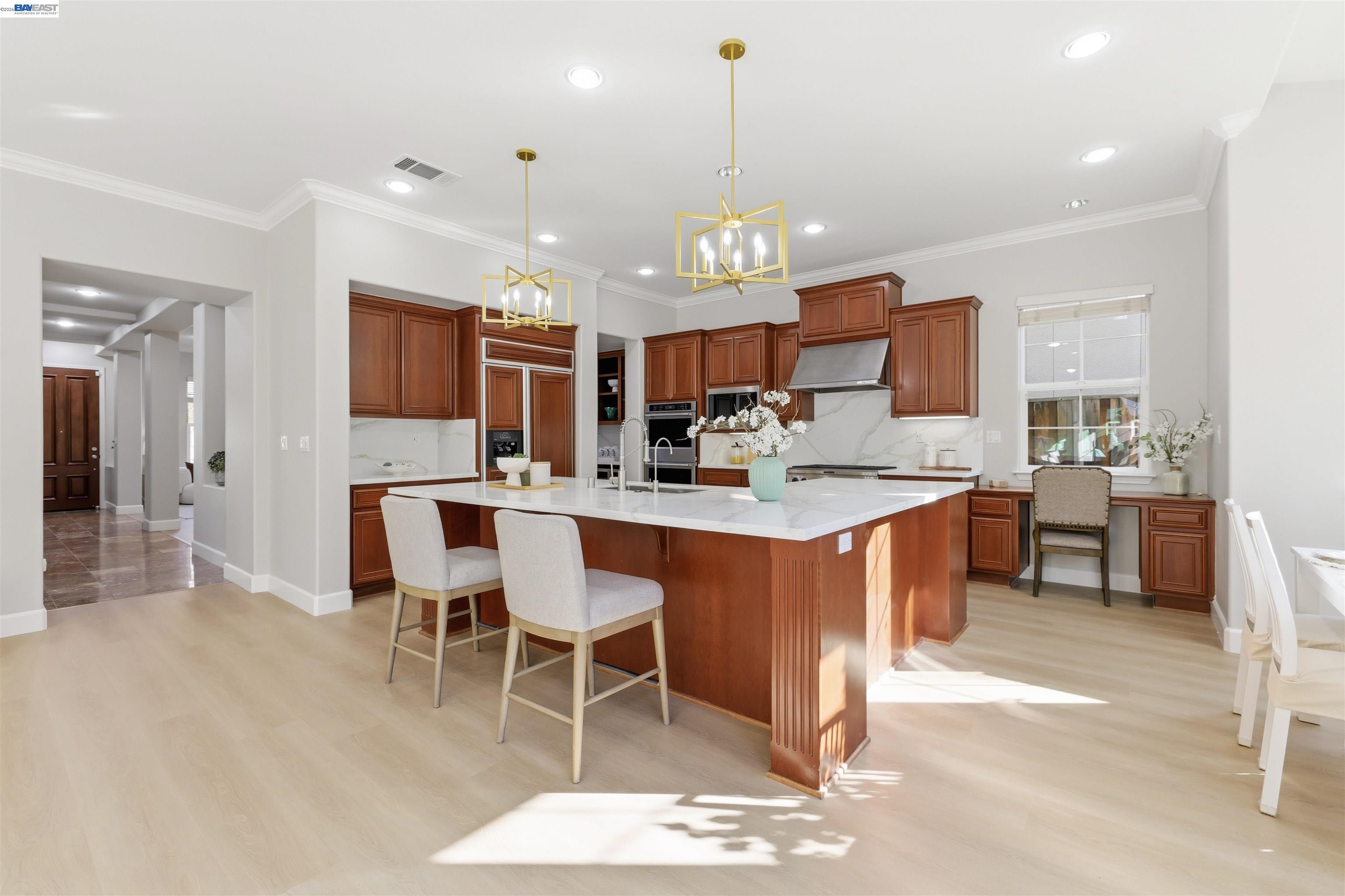 116 Macedon Court San Ramon, CA 94582 - Photo 13 of 60 a kitchen with stainless steel appliances kitchen island granite countertop a sink and cabinets