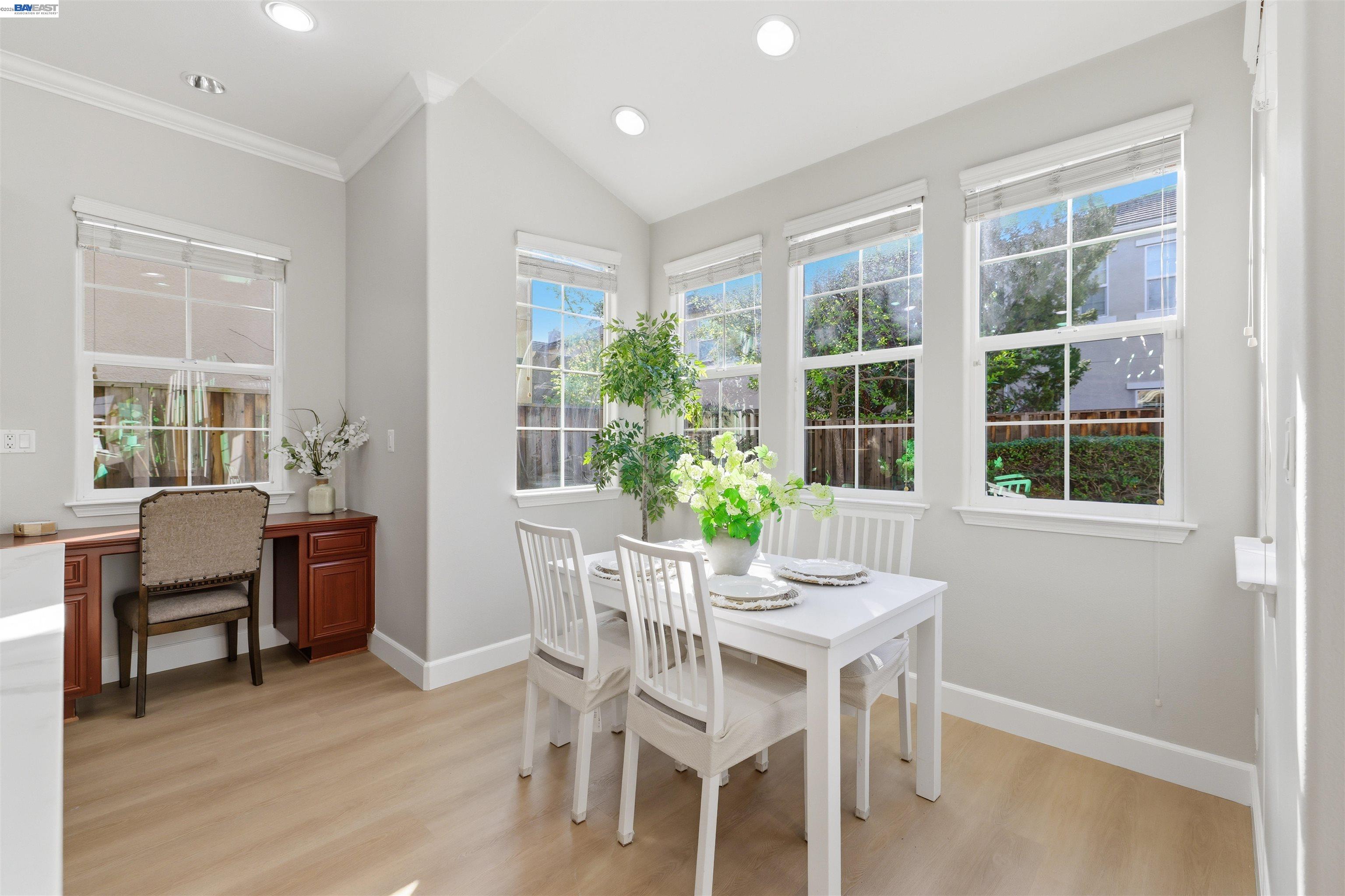 116 Macedon Court San Ramon, CA 94582 - Photo 19 of 60 a dining room with furniture window outside view and wooden floor