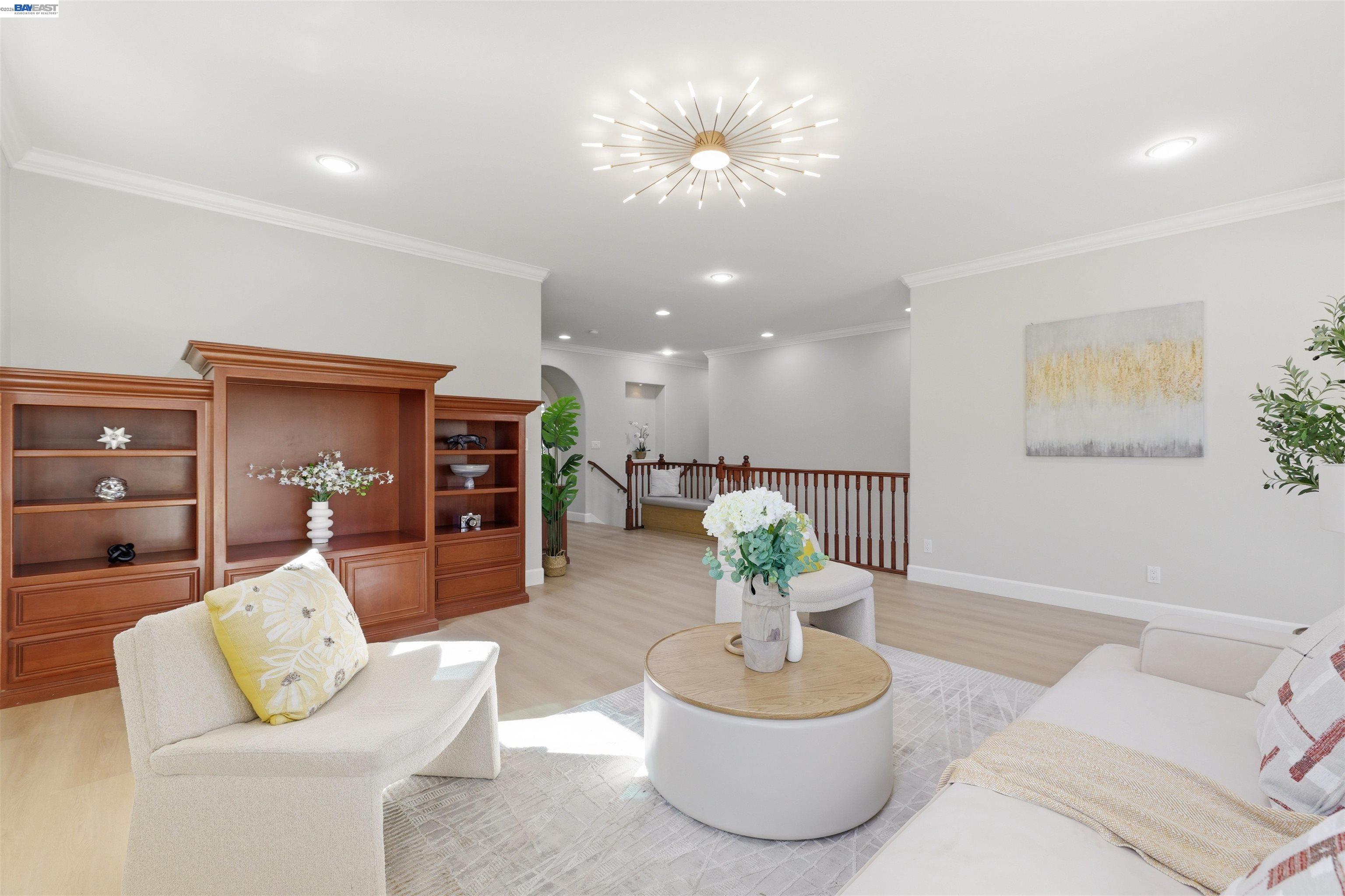 116 Macedon Court San Ramon, CA 94582 - Photo 32 of 60 a living room with furniture and a chandelier