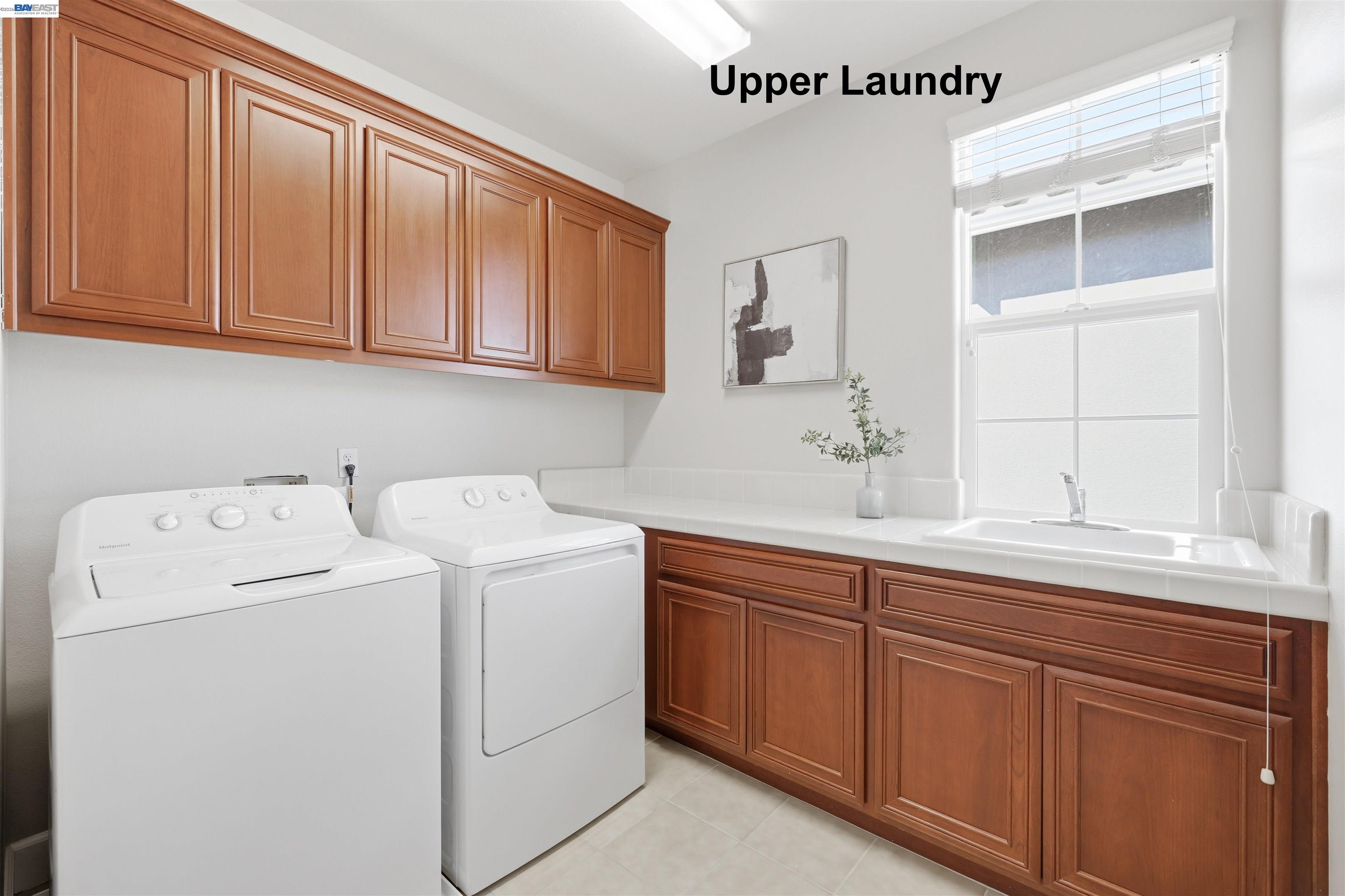 116 Macedon Court San Ramon, CA 94582 - Photo 47 of 60 a utility room with sink dryer and washer