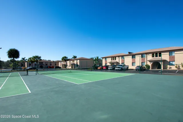 a view of a house with a big yard