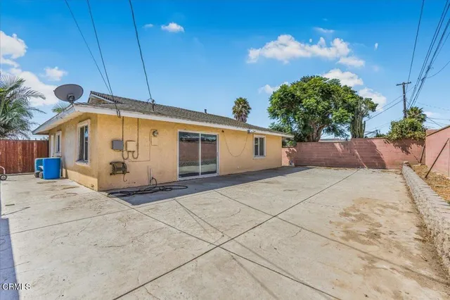a view of a backyard of the house